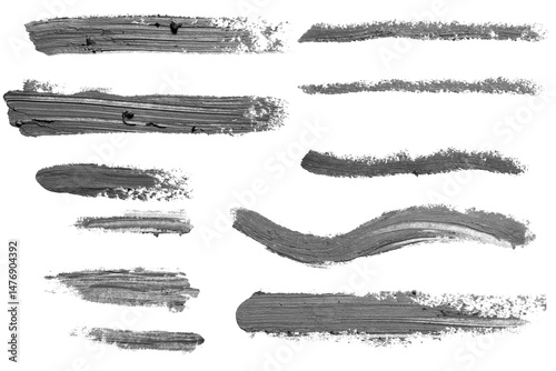 Set of gray smears with a pencil on an empty background.