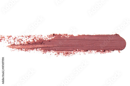 Smear of nude lip pencil on an empty background.
