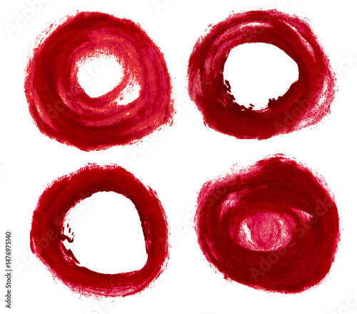 Set of circles drawn with red lipstick on an empty background.