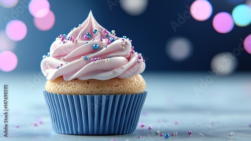 Pink Frosted Cupcake with Sprinkles on Blue Background
