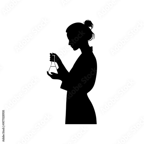 Female researcher or scientist holding a beaker in silhouette.

