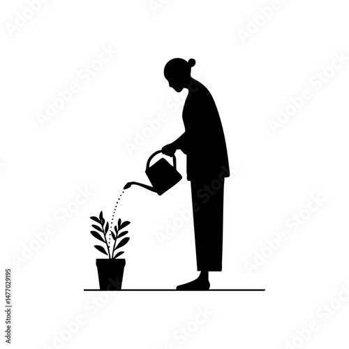 Female silhouette watering potted plant

