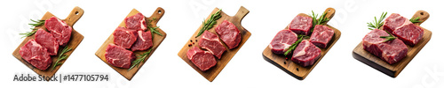 Raw beef meat steaks arranged on a wooden board with rosemary leaves on transparent background photo
