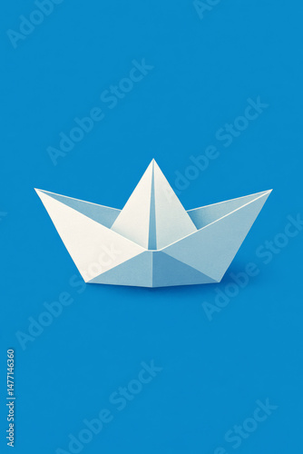Wallpaper Mural paper boat on blue background Torontodigital.ca