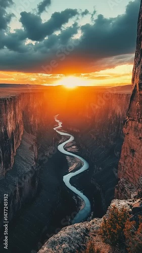 Serene Sunset Over Winding Canyon River Landscape