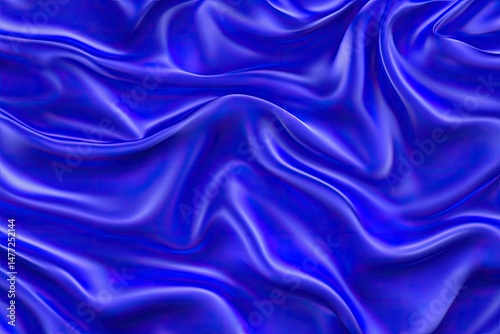 Deep blue, vibrant silk drapes in flowing folds.  Detailed and smooth texture