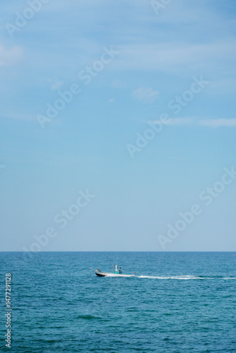 Endless Ocean Horizon Beneath a Clear Blue Sky
