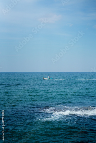 Speedboat Racing Across the Deep Blue Sea
