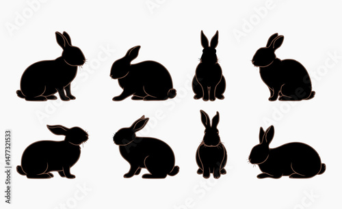Set of Rabbit Silhouettes in Black, Displaying Multiple Stances of Sitting, Standing, and Hopping