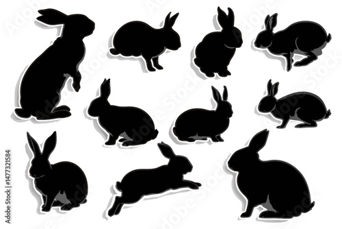 Set of Black Rabbit Silhouettes Displaying Multiple Poses and Movements Such as Hopping and Sitting