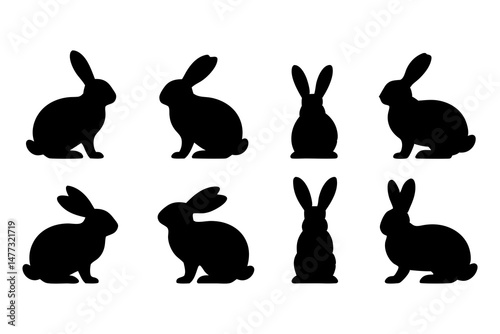 Collection of Eight Black Silhouettes of Rabbits in Different Poses Including Sitting and Standing