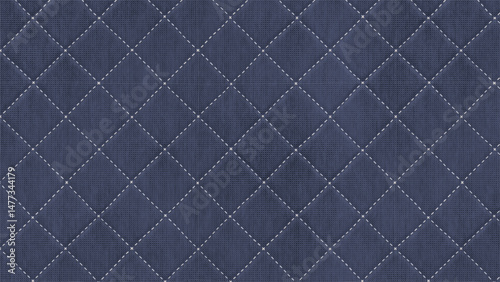 A close up of a blue quilted fabric with white stitching pattern design
