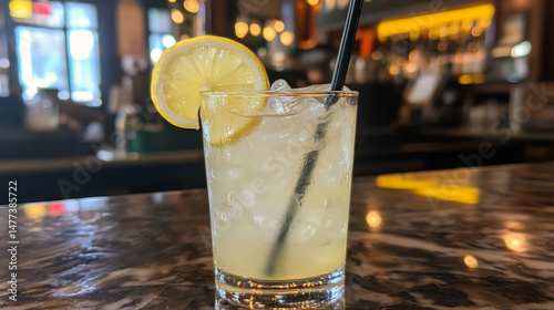 Chilled, refreshing lemonade served over ice as a cool, non-alcoholic beverage option. photo