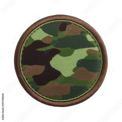 Round camouflage patch with green, brown, and black pattern, often used for military or outdoor gear. patch has brown border and rugged texture, suitable for tactical clothing or accessories