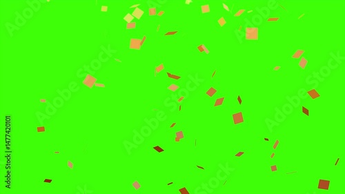 Golden confetti falling against green screen