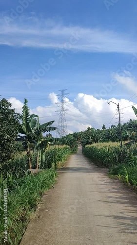 path in the countryside with clouds 