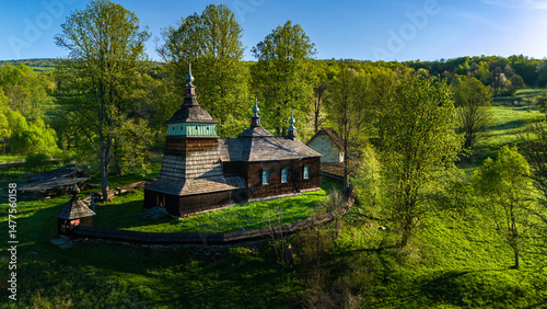 Fototapeta Naklejka Na Ścianę i Meble -  Aerial drone view of St. Cosmas and Damian Orthodox Church, Bartne, Poland