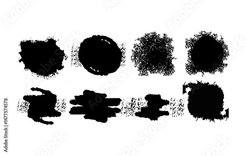 Collection of hand drawn ink blots and brush strokes in black