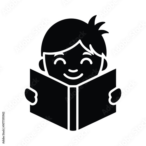 Black and white silhouette illustration of a happy young boy reading a book while smiling widely.