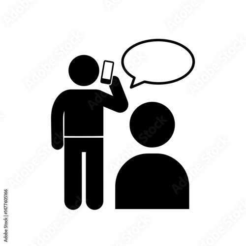 Person talking on phone while another person listens attentively