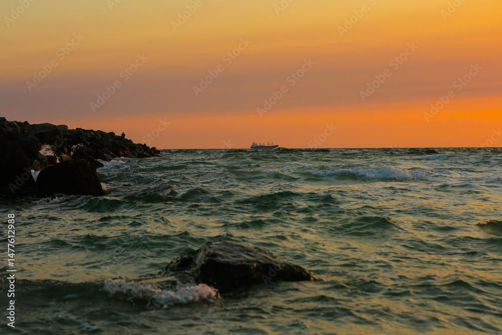 Naklejka premium sunset on the beach