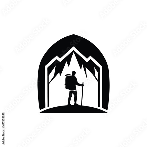 Silhouette of a hiker with backpack standing in front of mountain peaks outdoors adventure exploration travel
