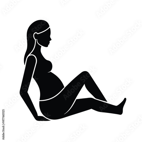 Silhouette of a pregnant woman resting sitting down in a relaxed position depicting pregnancy and motherhood