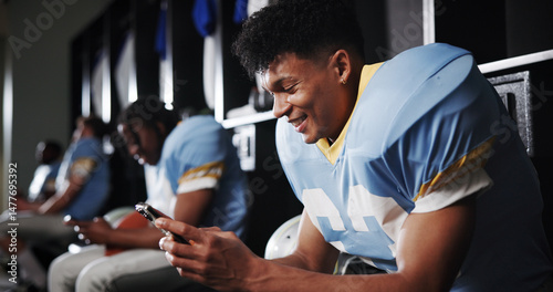 Foto Football, phone and happy with man in locker room for rookie drafting, pro league research and contact
