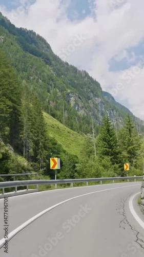 Vertical view of Austria road from car