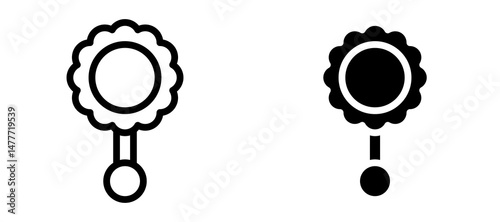 baby rattle icon in black modern and lines and solid