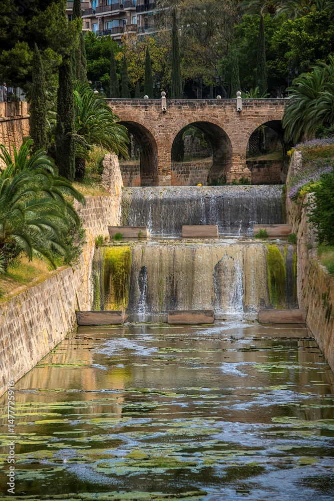 Obraz premium small river called riera in the old town of Palm on the Spanish island of Majorca