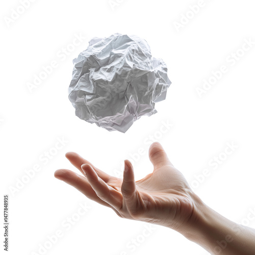 A hand gently tossing a crumpled paper ball isolated on transparent background (2)