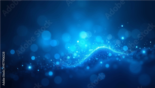 RGB electric blue glow particles with soft bokeh effect on dark abstract background.