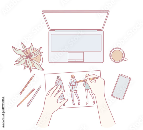 A stylish and inspiring workspace featuring fashion sketches, a laptop, and coffee for endless creative inspiration