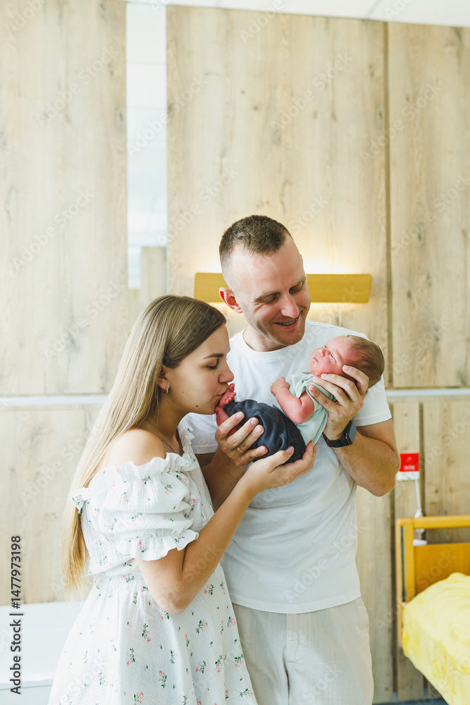 New Parents Cherish Their Newborn in the Hospital Setting as they embark on this remarkable journey of parenthood, celebrating the profound bond between them and their infant with love and joy