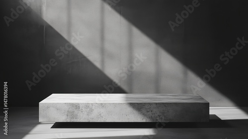 Minimal concrete podium with dramatic sunlight and shadows for product mockup, branding scene, or modern background design