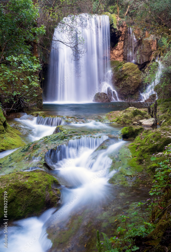 Obraz premium View of the beautiful waterfall of the Moors River near Conímbriga in Condeixa, Portugal.