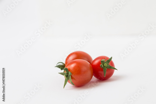Red Cherry Tomatoes on White Background