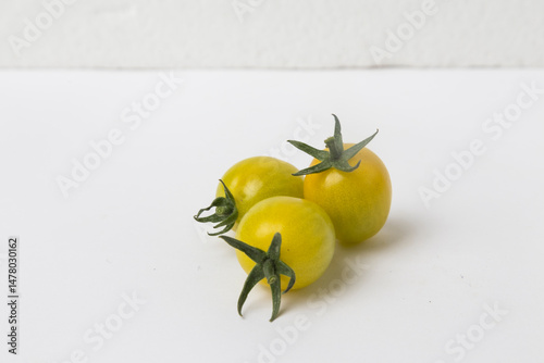 Yellow Cherry Tomatoes on White Background