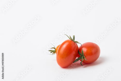 Red Cherry Tomatoes on White Background