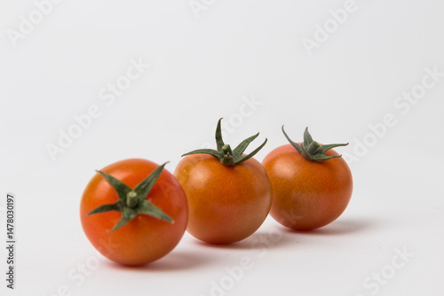 Red Cherry Tomatoes on White Background
