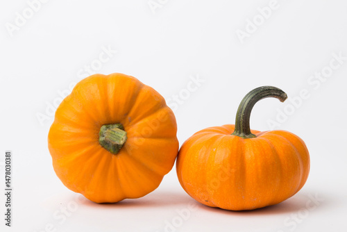 Mini Orange Pumpkins on White Background