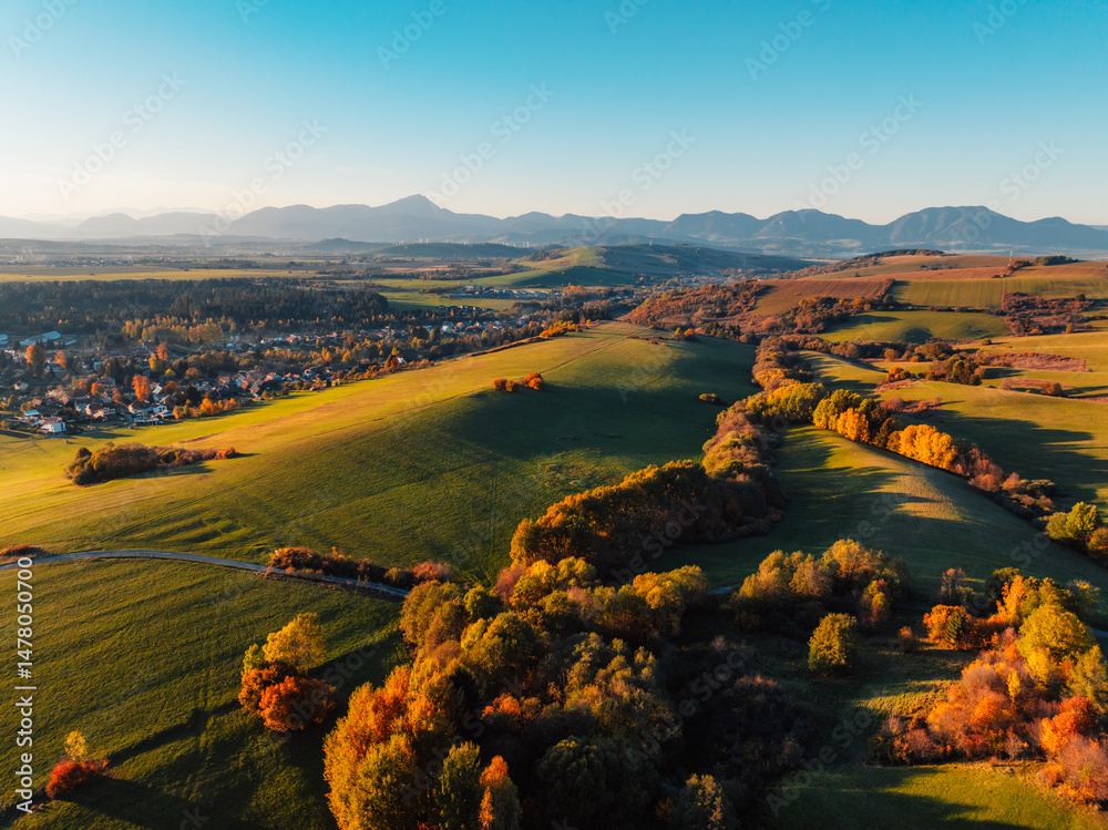 Sunset over Liptov region with and High Tatras mountains around. Liptovsky Mikulas landspace, slovakia.