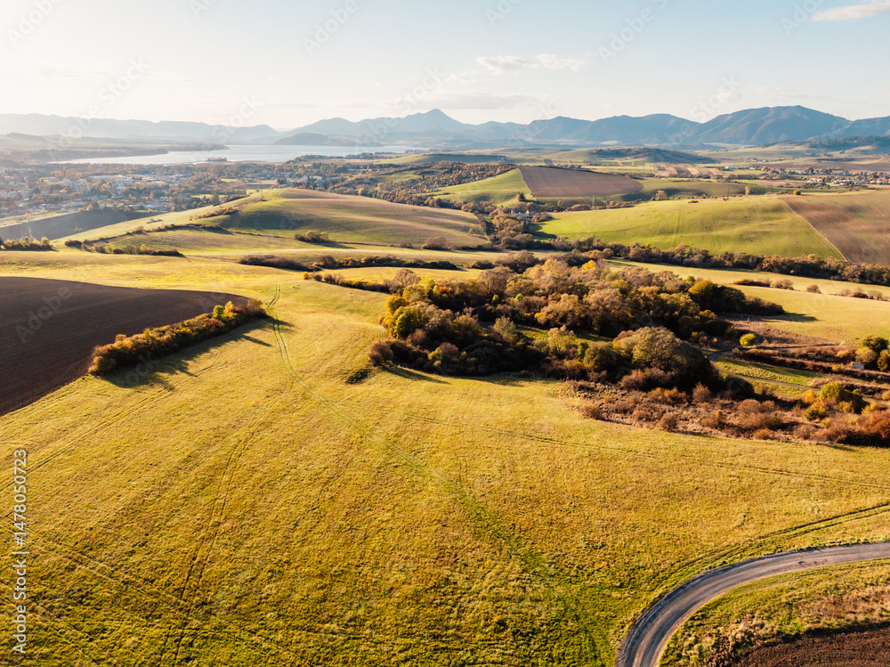Sunset over Liptov region with High Tatras mountains around. Liptovsky Mikulas landscape, Slovakia.