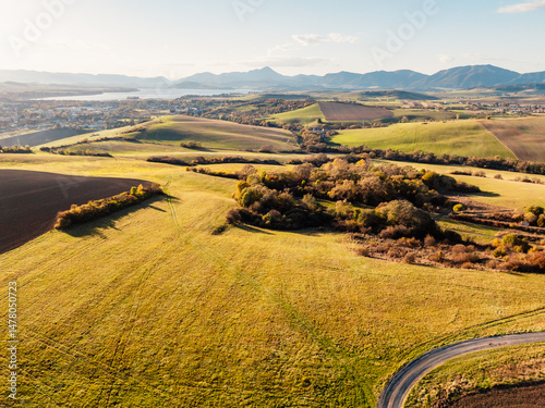 Obraz na płótnie Sunset over Liptov region with High Tatras mountains around. Liptovsky Mikulas landscape, Slovakia. w salonie