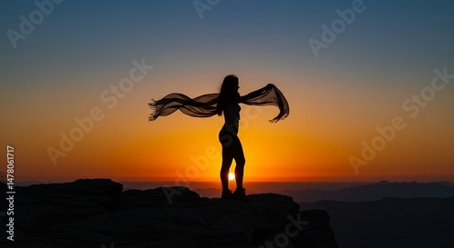 Woman with Scarf at Sunset