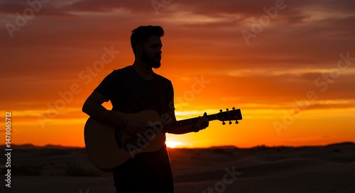 Guitar Player Silhouette at Sunset