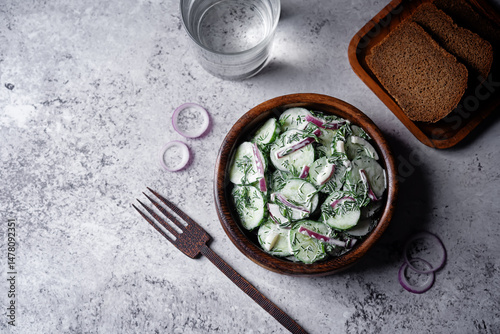 Cucumber red onion dill salad in a bowl