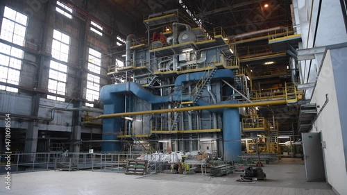 Industrial machines. Internal structure of large thermal power plant. The interior of an industrial boiler room with many pipes, valves and sensors. Lithuania, Vilnius