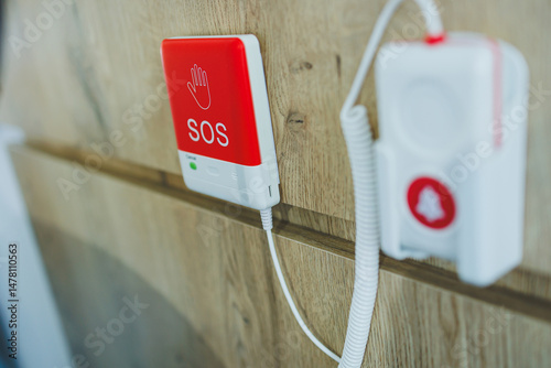 An Emergency SOS Alert System has been installed on the wall, featuring a connected button that enables swift response in times of crisis and ensures immediate assistance when needed